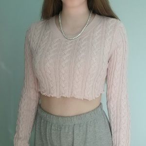 Pink cropped cable-knit sweater!